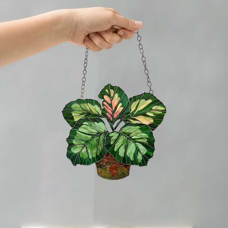 Calathea Medallion leaves window hanging, Flowers Acrylic Window Hanging Art Decoration, Monstera plant Ornament, Gift for her, Mom image 1 Calathea Medallion leaves window hanging, Flowers Acrylic Window Hanging Art Decoration, Monstera plant Ornament, Gift for her, Mom image 1 Calathea Medallion leaves window hanging, Flowers Acrylic Window Hanging Art Decoration, Monstera plant Ornament, Gift for her, Mom image 2 Calathea Medallion leaves window hanging, Flowers Acrylic Window Hanging Art Decoration, Monstera plant Ornament, Gift for her, Mom image 3  Export Images Report this item to Etsy  Go To Shop +29  Total Views 2,077 AVG View 27 Views 24H 7 Total Sold 78 Revenue 2K USD Sold 24H N/A Favorites 307 Market Favor. Rate ~14.78% Created 09/04/2024 (2 months) Updated 3 days ago Conversion Rate ~4%  Tags Copy Suggestions stained glass flower house decor suncatcher window hangings hanging decor gift for her stained glass flowers glass plant decor monstera monstera leaves gift for mom calathea medallion Categories Copy Art & Collectibles, Glass Art, Suncatchers HeyEtsy.com  Price:US.59+  Original Price:US.99+  40% off Sale ends in 5 days  Local taxes included (where applicable) Calathea Medallion leaves window hanging