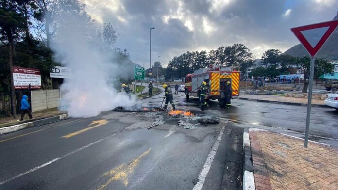 Bus set alight in Philippi, tyres burnt in Hout Bay as protests flare up in Cape Town | News24
