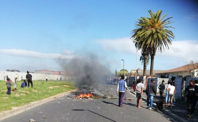 Police, residents clash over land near military base in Cape Town