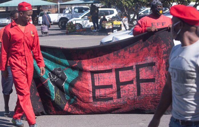 WATCH | Elderly shopper pulls gun on EFF members during standoff in PE shopping centre