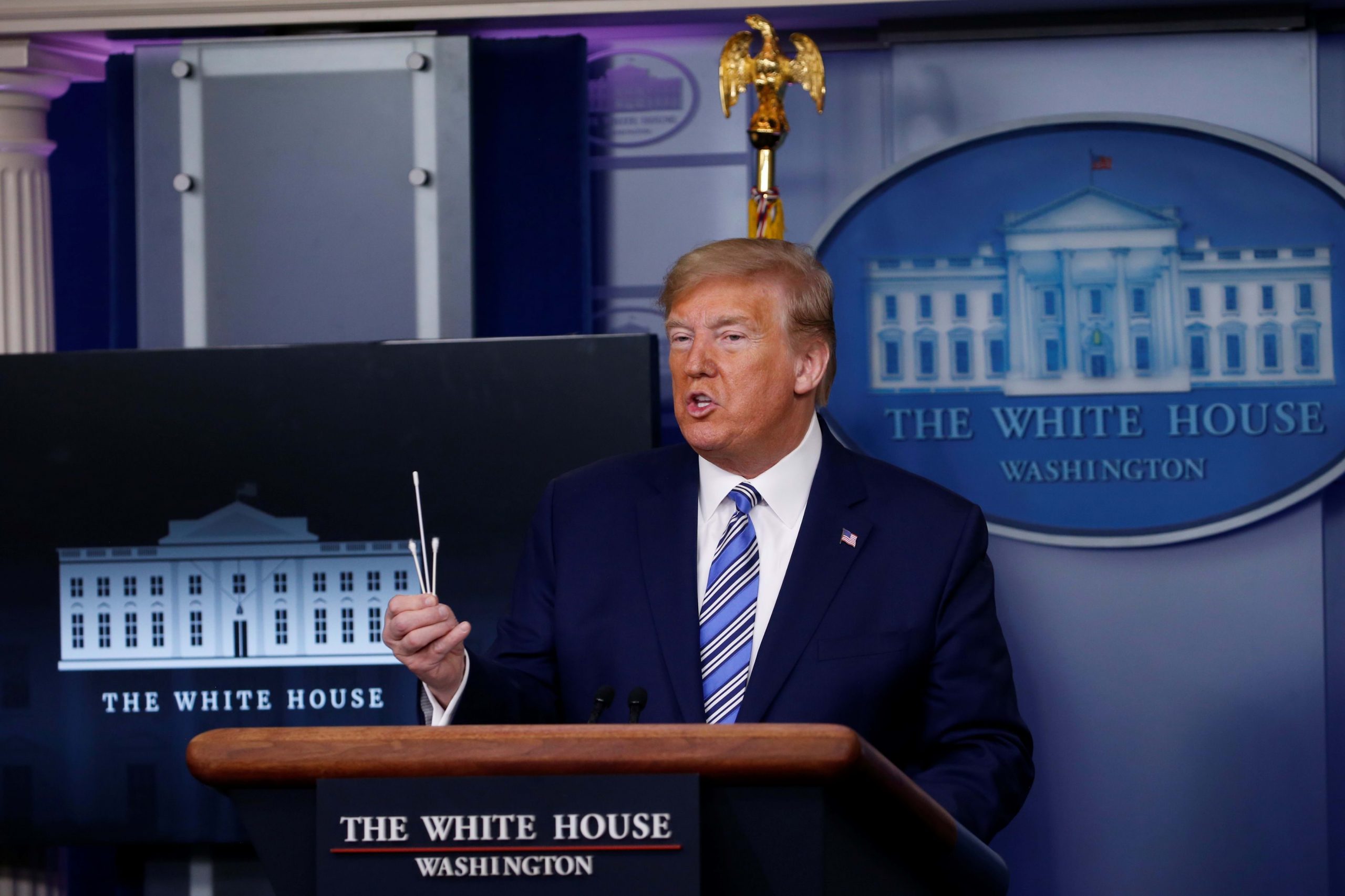 Trump to use Defense Production Act to increase swab production amid coronavirus screening shortage