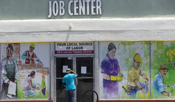 Unemployment rate spikes to 14.7%, highest since Great Depression