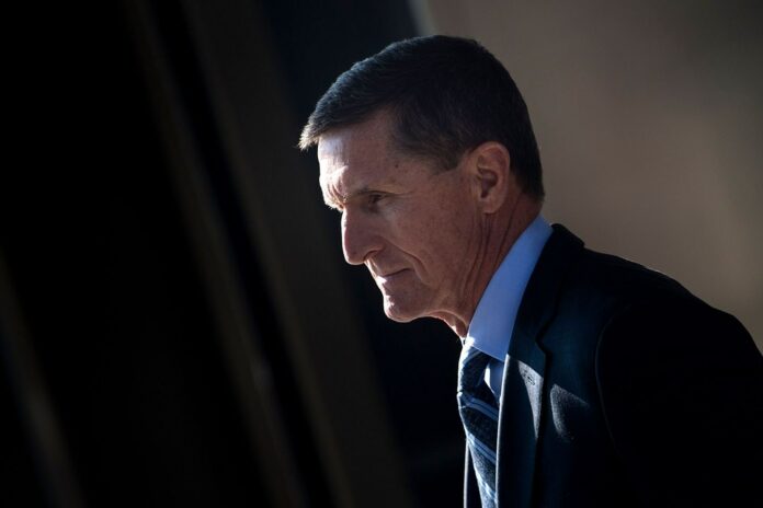 U.S. judge puts Justice Department’s move to drop charges against Michael Flynn on hold