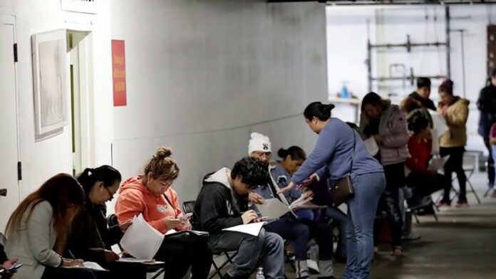 Out-of-work Americans still waiting for jobless aid as states struggle to process claims