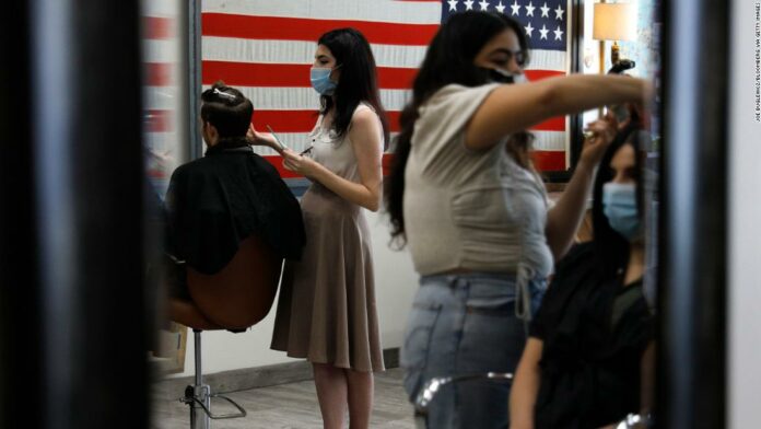 Over 100 experts are calling on states to mandate masks, face coverings