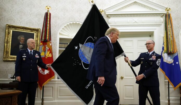 Trump receives flag of new Space Force for Oval Office