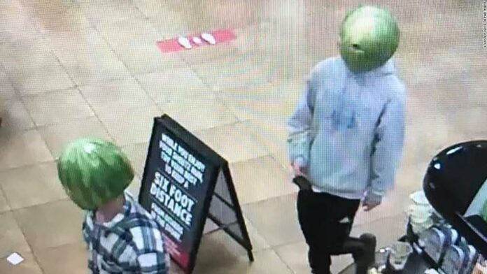 A man who wore a watermelon on his head while stealing from a convenience store has been arrested