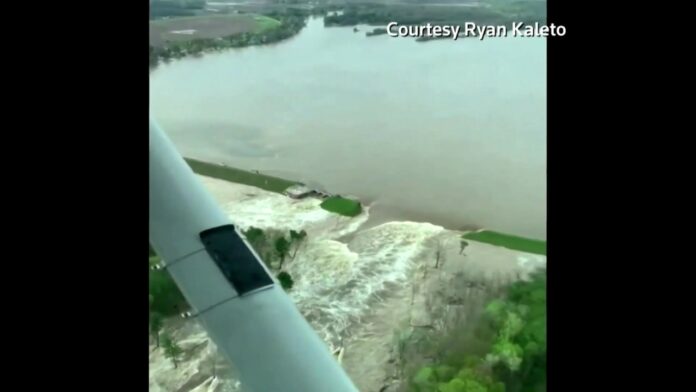 Michigan governor declares emergency after dams collapse