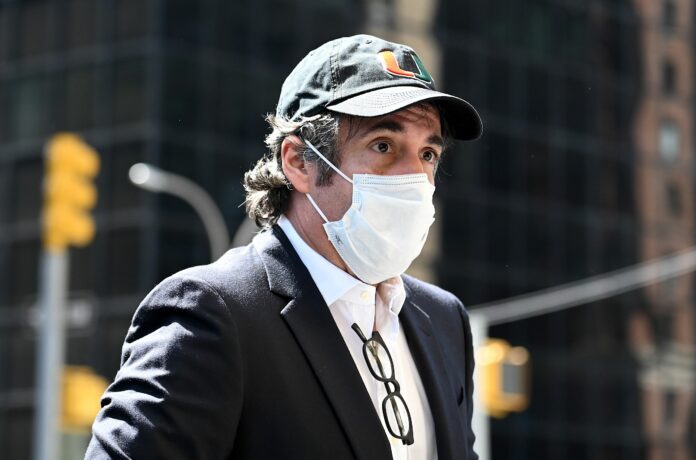 Former Trump lawyer Michael Cohen released from prison into home confinement due to coronavirus concern