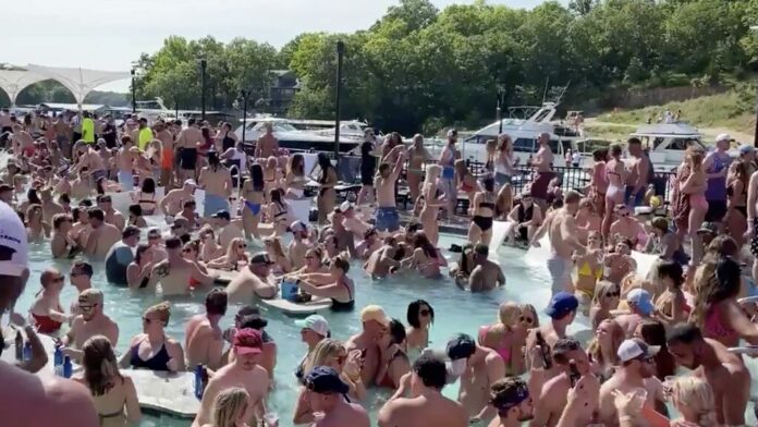 Missouri’s Lake of the Ozarks packed, prompting coronavirus travel advisory
