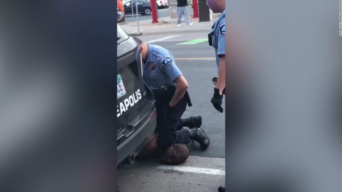 FBI investigates death of a black man in Minneapolis after video shows police officer kneeling on his neck