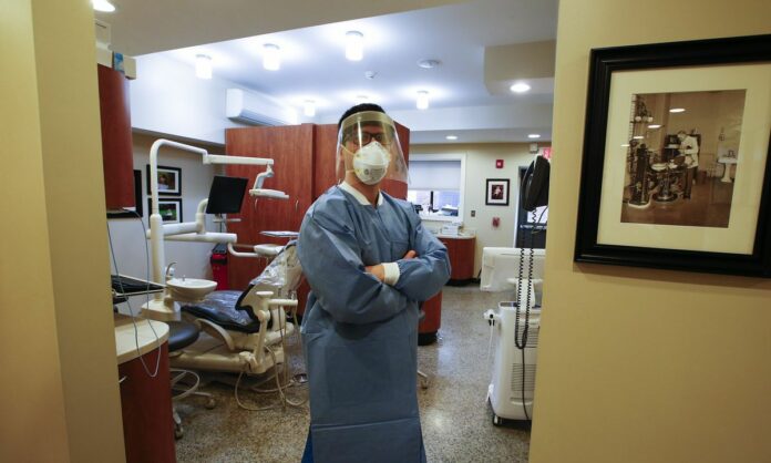 A PPE fee at the dentist? New requirements could raise prices for patients.