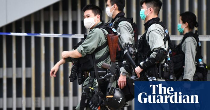 Hong Kong crisis: riot police flood city as China protests build