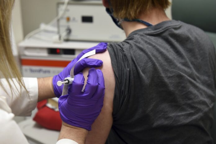 AP-NORC poll: Half of Americans would get a COVID-19 vaccine