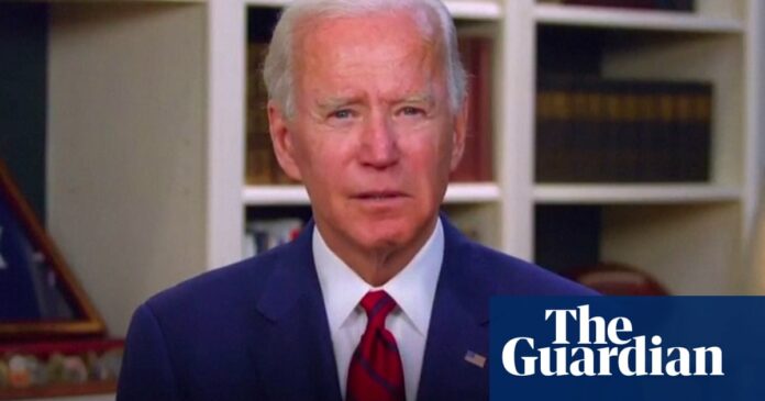 Biden sets solemn tone as Trump waits 15 hours to mark Covid-19 milestone