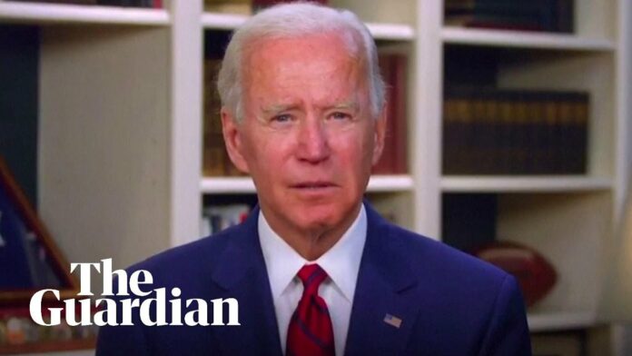 Joe Biden reacts as US coronavirus death toll passes 100,000