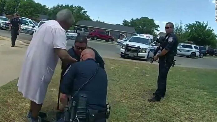 Police tried to stop a black man after they say he rolled through a stop sign. A tense confrontation followed.