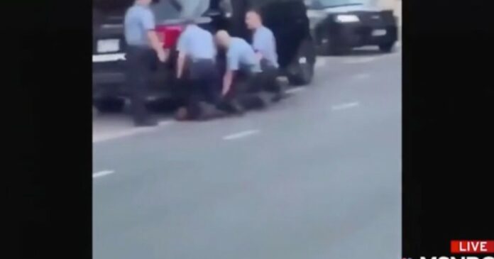 Second video of George Floyd arrest appears to show multiple officers kneeling on him