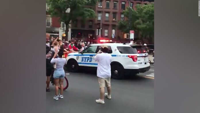 Video appears to show NYPD truck plowing through crowd during protest