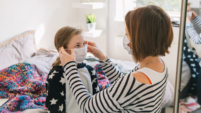 Wearing a mask at home could help stop coronavirus spread among family members, study says