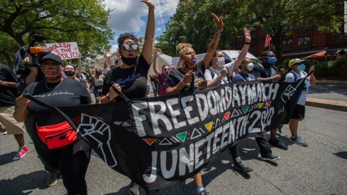 Amid nationwide rallies and celebrations, more cities, states and universities designate Juneteenth as an official holiday