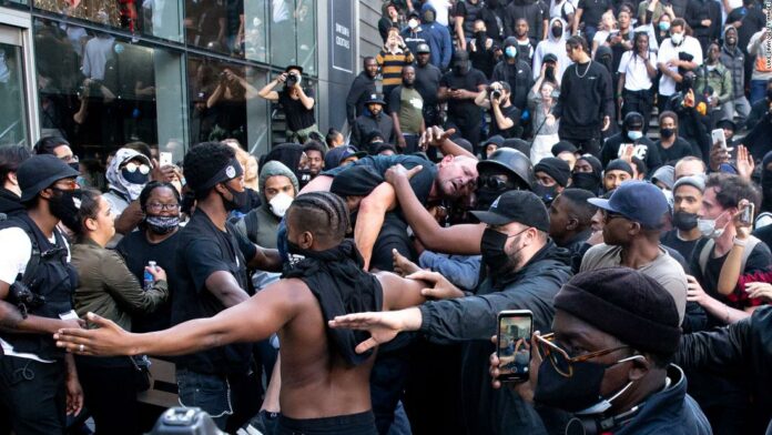 Black Lives Matter protester seen carrying a white man through an angry crowd in London says he wants ‘equality for all races and people’