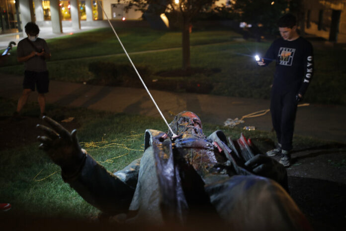 D.C. protesters pull down, burn statue of Confederate general