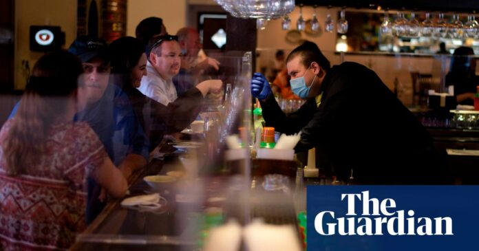 Half of US states see coronavirus spike as officials warn first wave far from over