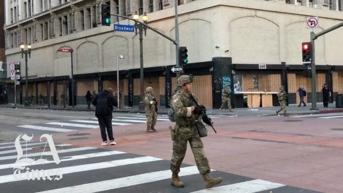L.A. turns to National Guard, curfew as violence, looting escalate