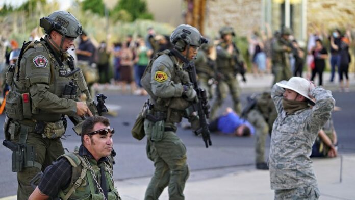 Man arrested in shooting during Albuquerque protest over conquistador statue