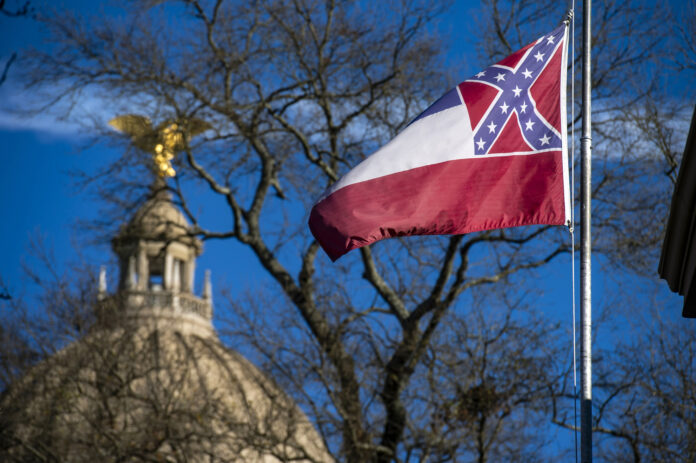 Mississippi legislators vote to remove Confederate battle emblem from state flag