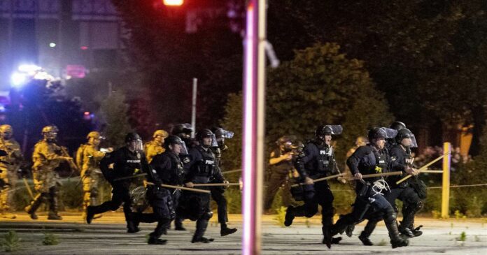 One dead in Louisville after police and national guard ‘return fire’ on protesters