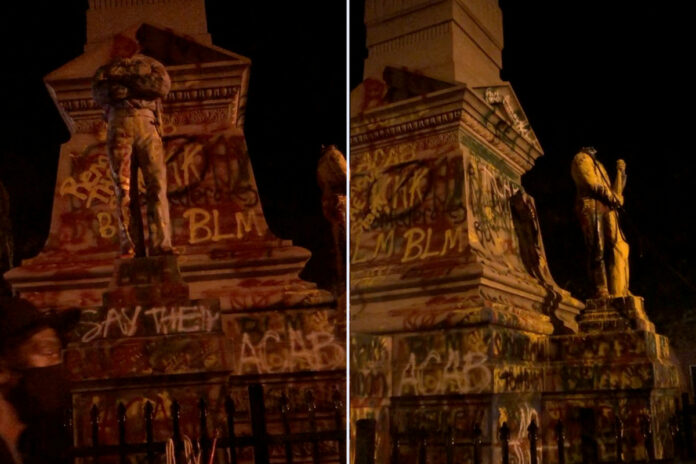 Protester severely injured when Confederate monument falls on his head