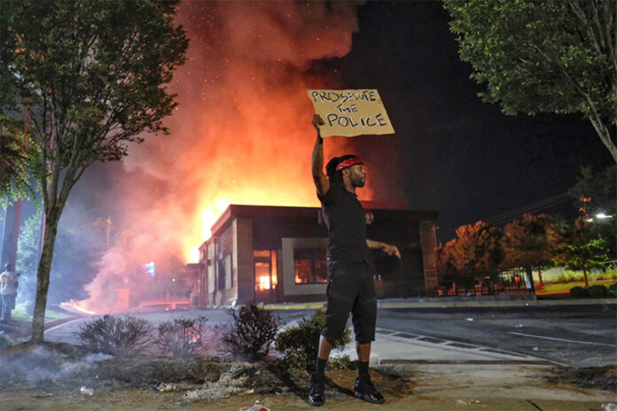 Protesters burn Atlanta Wendy’s where cops fatally shot Rayshard Brooks
