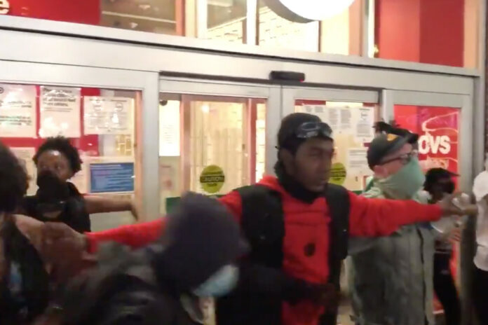 Protesters form human chain to defend NYC Target from looters