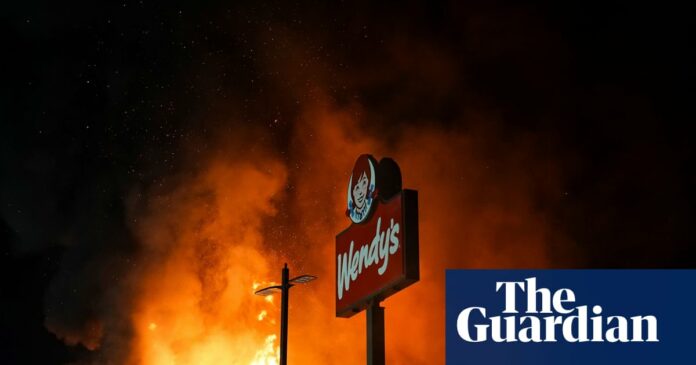 Rayshard Brooks: protesters set fire to restaurant where black man shot dead