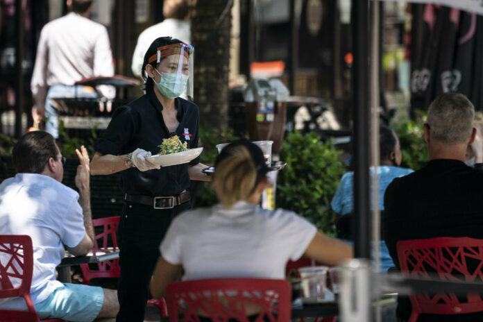 Record spike in new coronavirus cases reported in six U.S. states as reopening accelerates