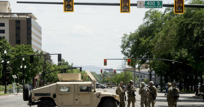 Salt Lake City police and National Guard block area where protest turned violent as curfew lifts