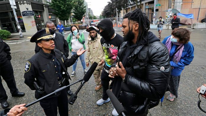 Seattle protesters declare ‘cop free zone’ after police leave precinct