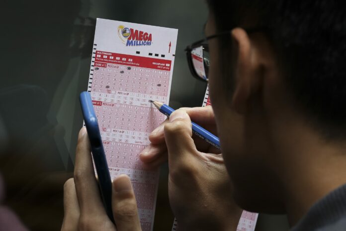 Someone nabbed the $410 million Mega Millions jackpot. Now, here’s that tax bill