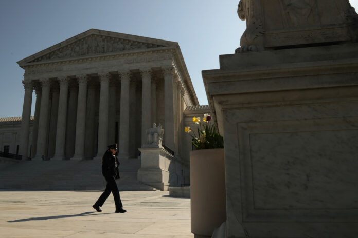 Supreme Court leaves consumer regulator standing but backs president’s ability to fire director