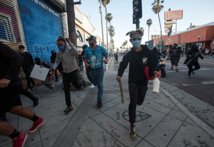 The Latest: California closes all downtown state buildings