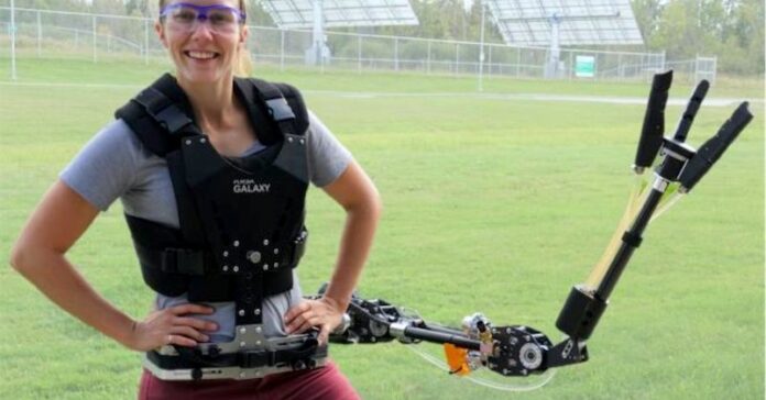 This wearable robotic arm can hold tools, pick fruit, and punch through walls