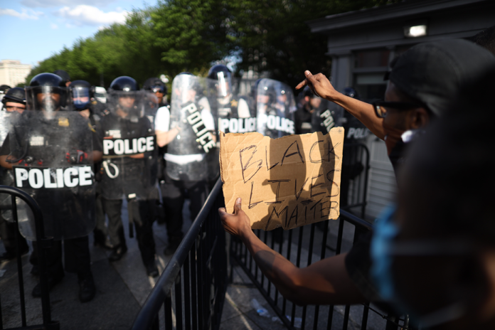 White House divided on Trump addressing racial tensions