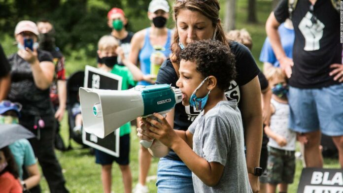 An 8-year-old boy organized a Black Lives Matter march for kids. Hundreds showed up.