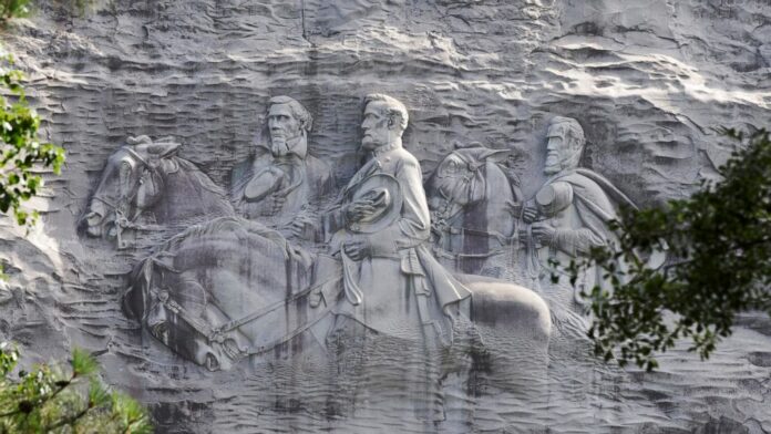 Armed protesters march through Georgia’s Stone Mountain Park