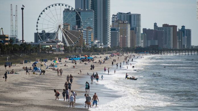 As coronavirus cases skyrocket, US marks July Fourth with pleas for people to skip the parties