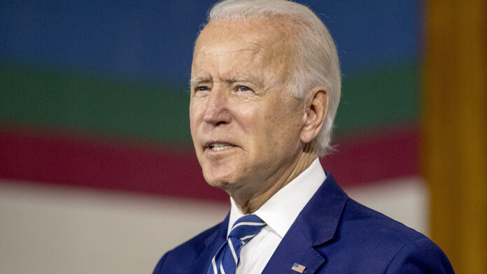 Biden plans, addressing issues from climate to elder care, near $10 trillion price tag