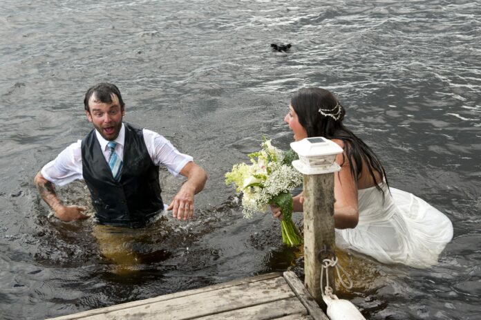 Bride, groom fall into river during wedding photos while attempting ‘romantic’ dance move