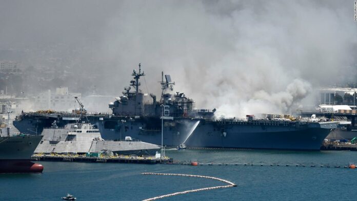 Federal firefighters battling blaze on Naval ship that could last for days